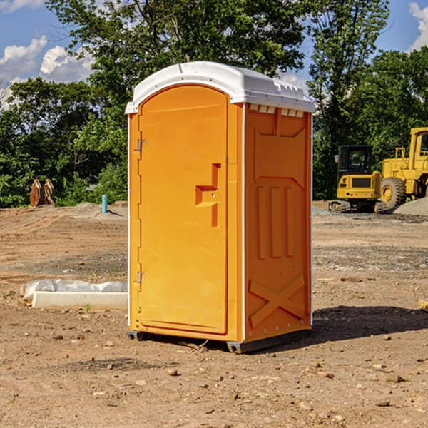 how often are the portable restrooms cleaned and serviced during a rental period in Walker